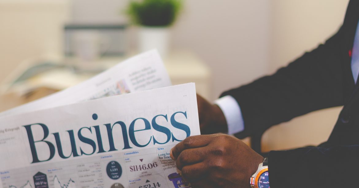 Business articles in newspaper