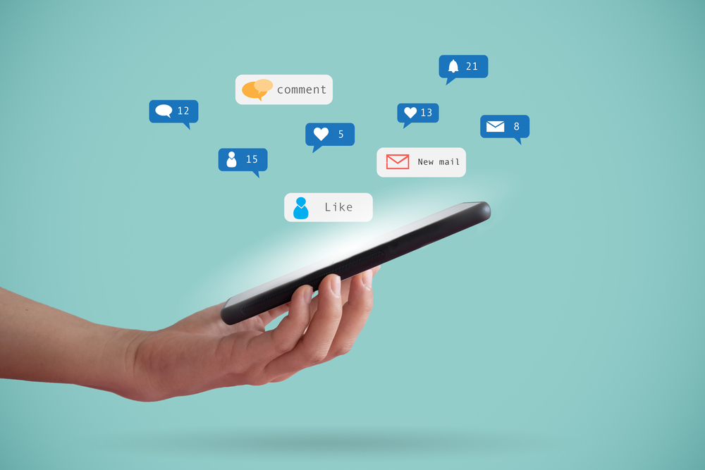 Hand,Hold,Smartphone,Play,Social,Media,With,Communication,Icon.,Technology Social Media Trends To Watch Out For In 2022