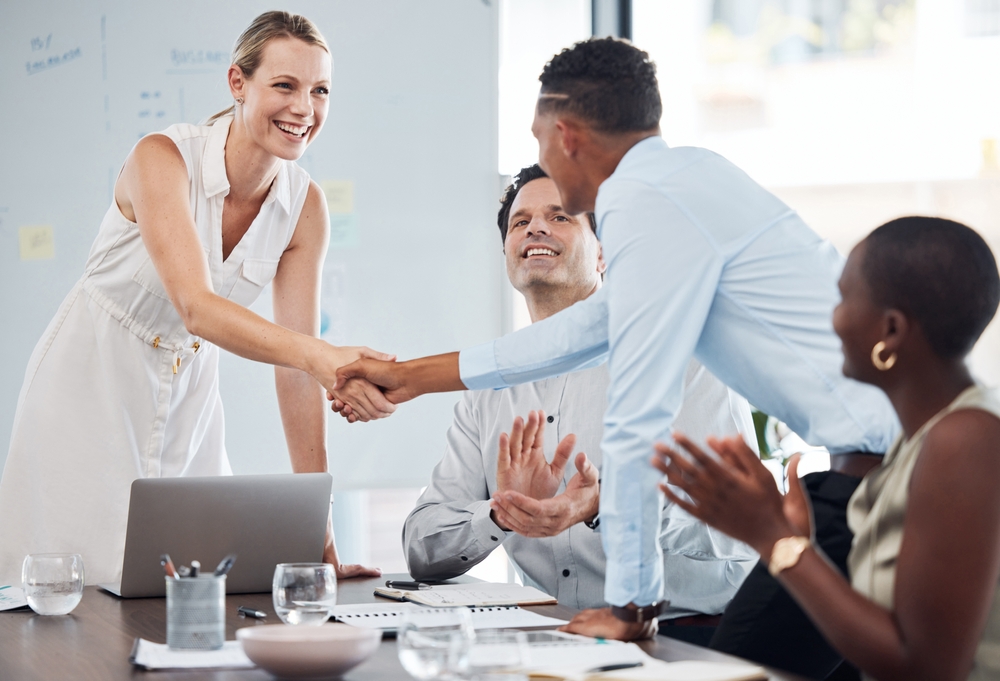 Handshake,,Team,And,Agreement,On,Business,Partnership,Meeting,,Merger,Or Meeting new people