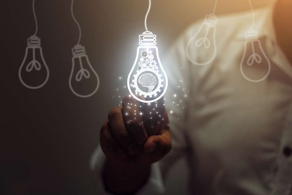 Businessman,Touching,Light,Bulbs.,Ideas,Of,New,Ideas,With,Innovative